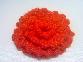 Broche de crochet de flor en espiral
